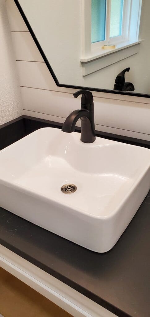 Two updated bathrooms remodeled by Rydman Enterprises in Boring, Oregon
