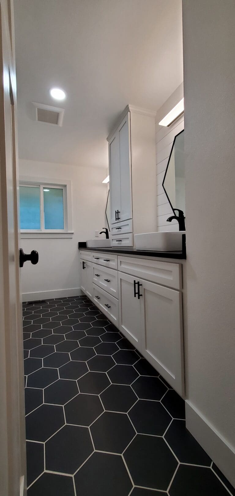 Two updated bathrooms remodeled by Rydman Enterprises in Boring, Oregon