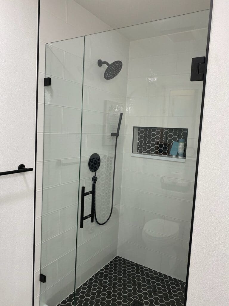 Two updated bathrooms remodeled by Rydman Enterprises in Boring, Oregon