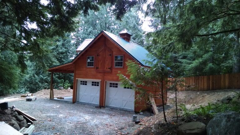 Custom hobby barn with cedar siding and metal roof built by Rydman Enterprises in Sandy, Oregon
