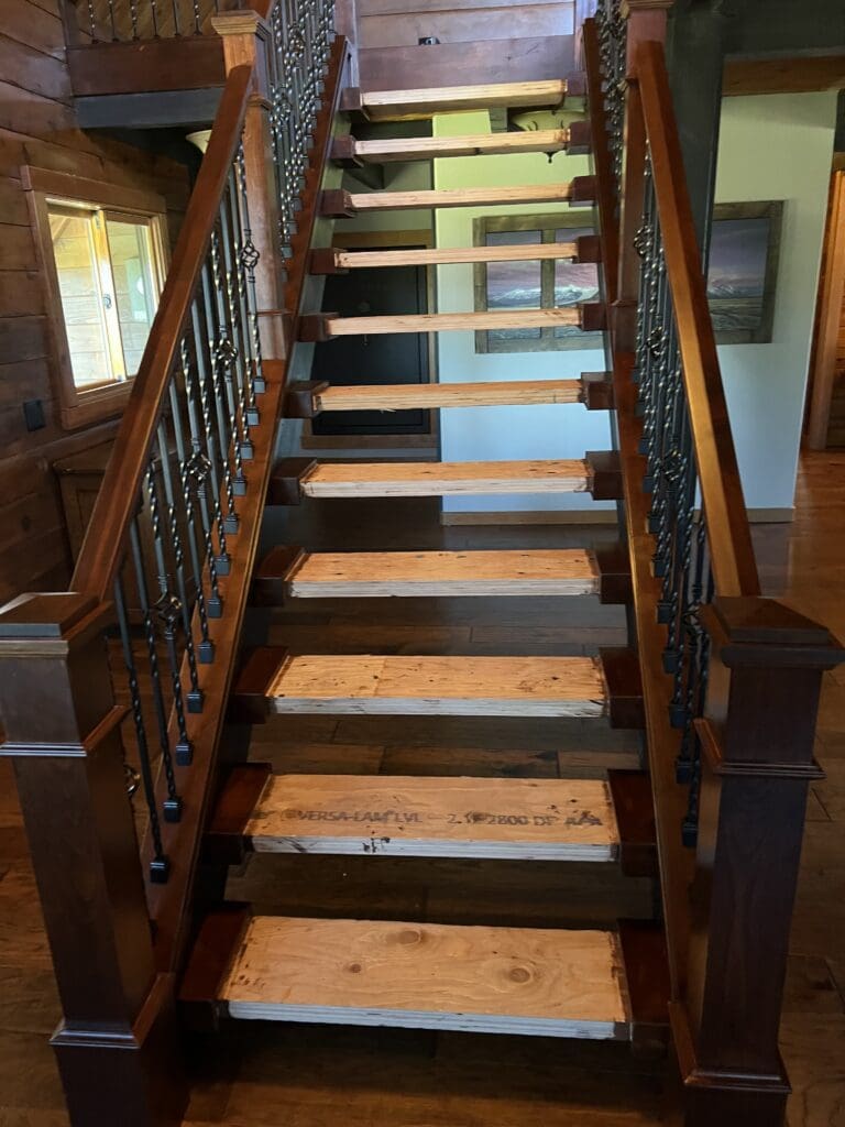 Custom wood and wrought iron staircase and loft railing remodeled in a Sandy, Oregon home