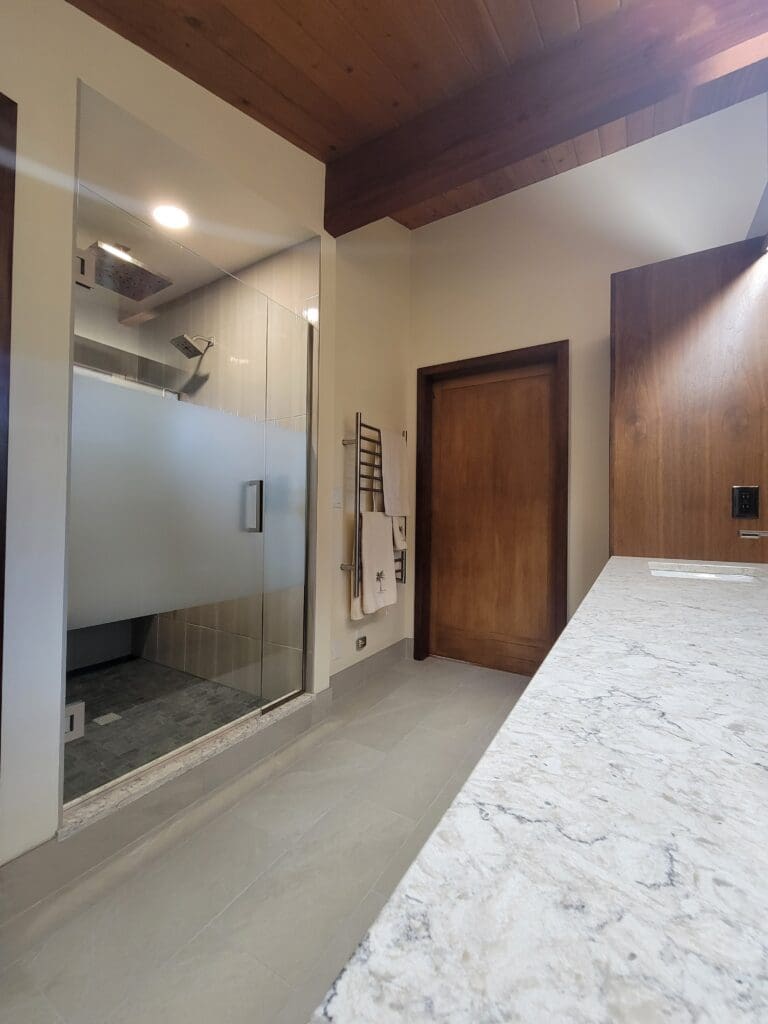 Expanded custom primary bathroom remodeled by Rydman Enterprises in Boring, Oregon